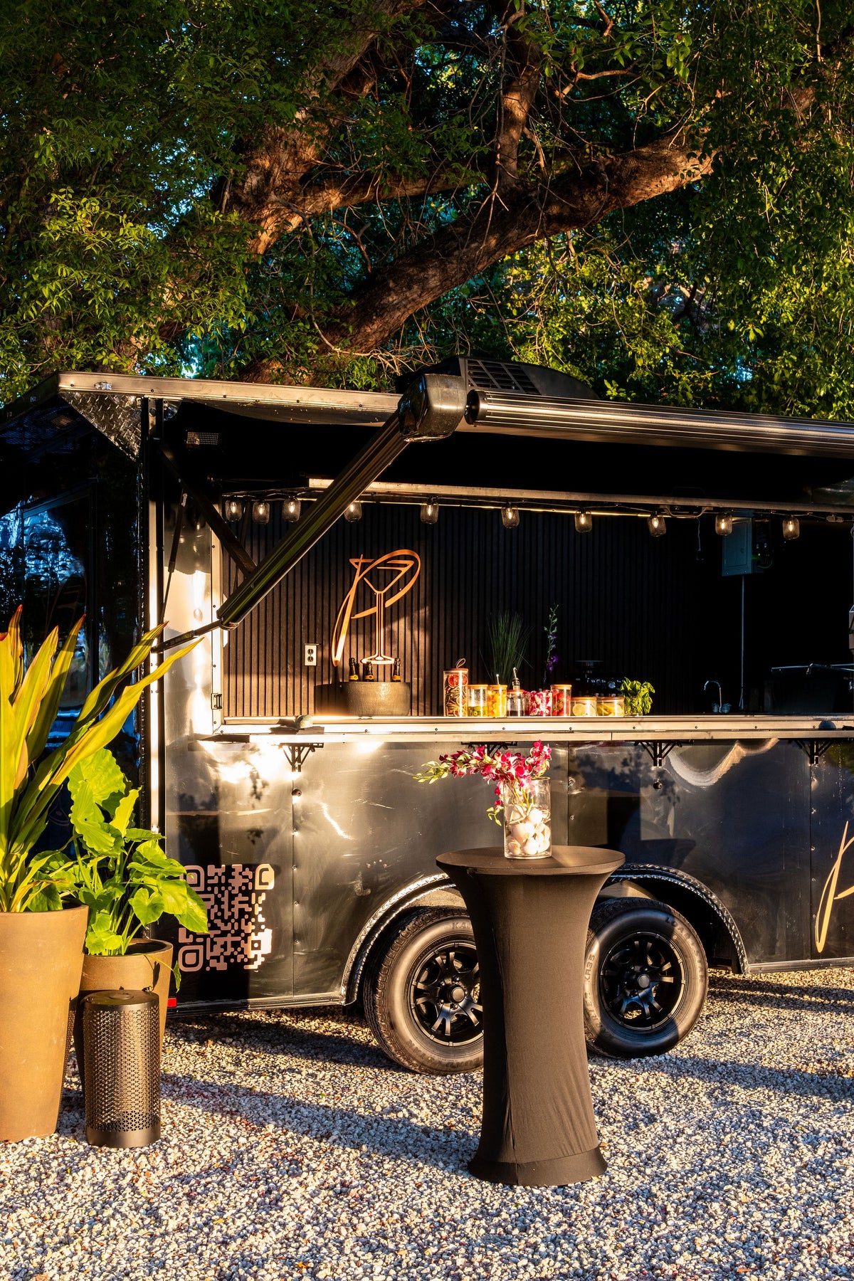 Mobile Bar Trailer with open door in a natural setting