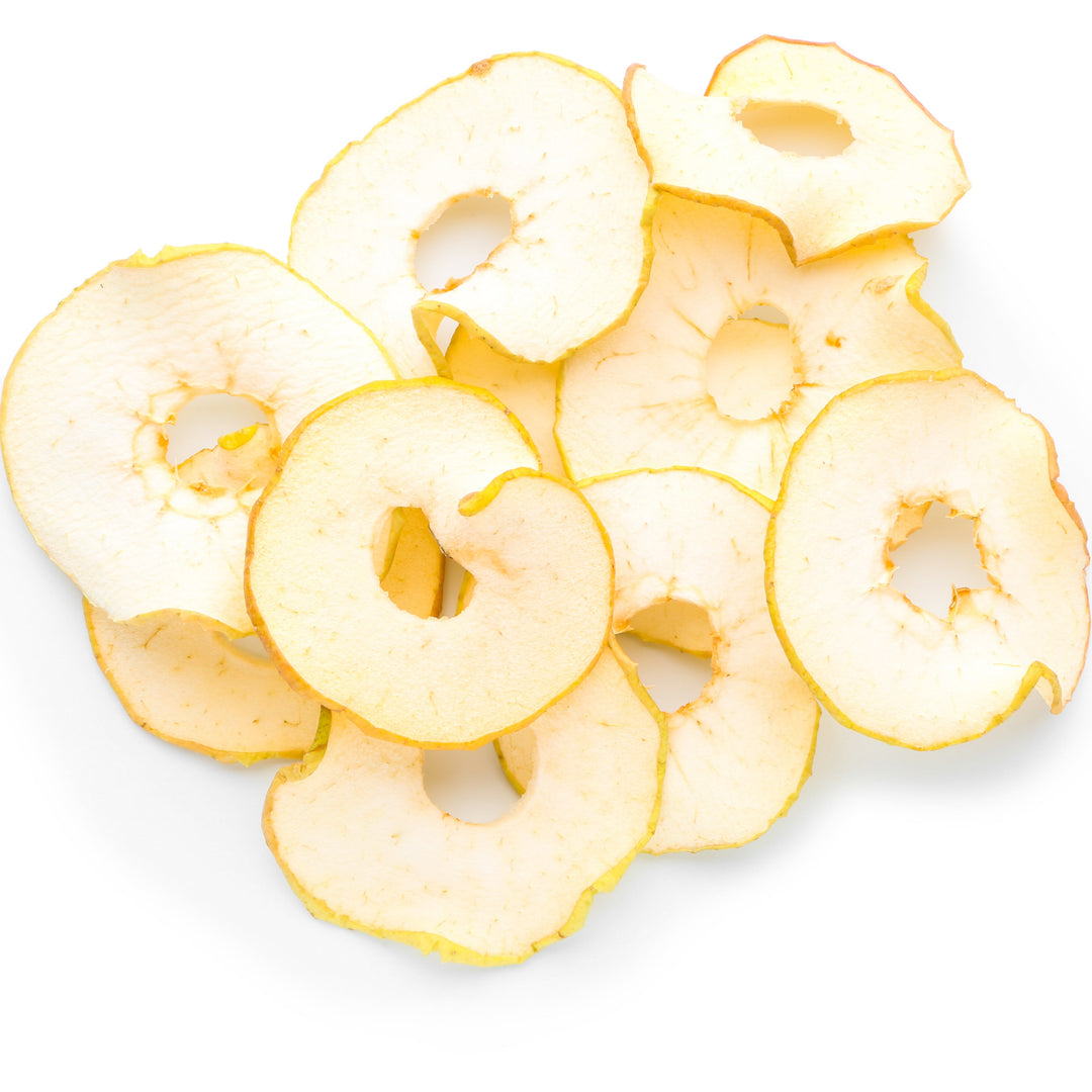 Dried apple slices on a white background