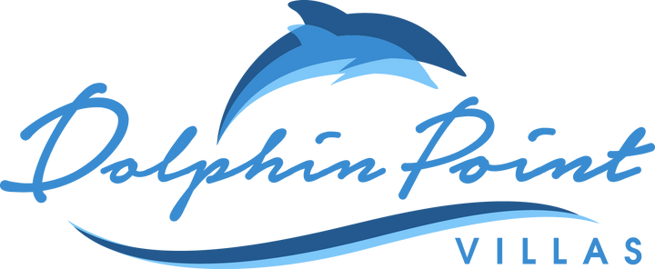 Logo of Dolphin Point Villas with a blue dolphin and text on a white background