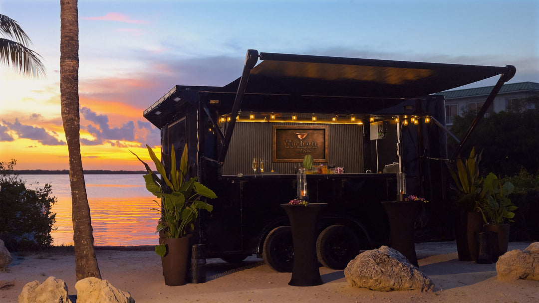 Outdoor Mobile bar setup on a Florida Keys beach with sunset view